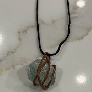 Fluorite crystal with copper necklace